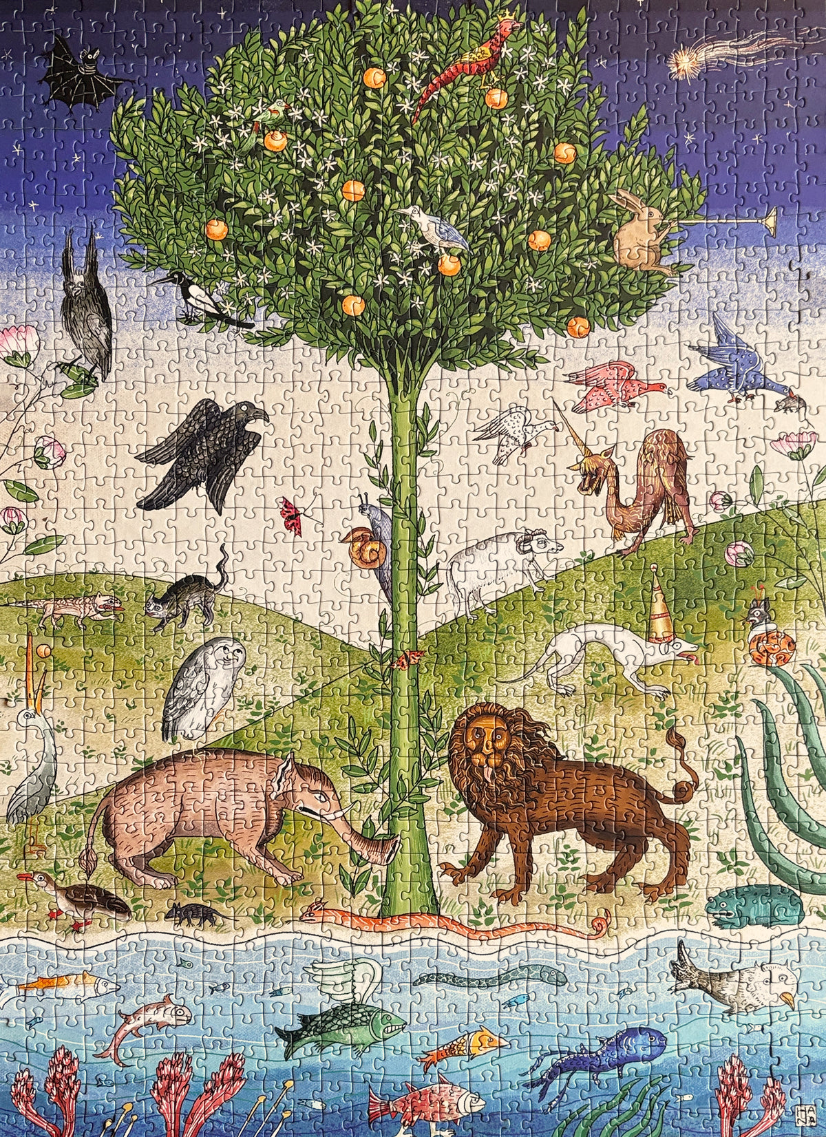 The finished jigsaw: medieval-style animals, including a lion, around a fruit tree above a river of fish